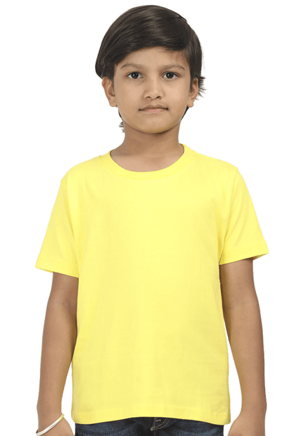 Kid wearing a yellow plain round neck t-shirt made from 180 GSM super combed bio-washed fabric, pre-shrunk and durable with double stitched seams