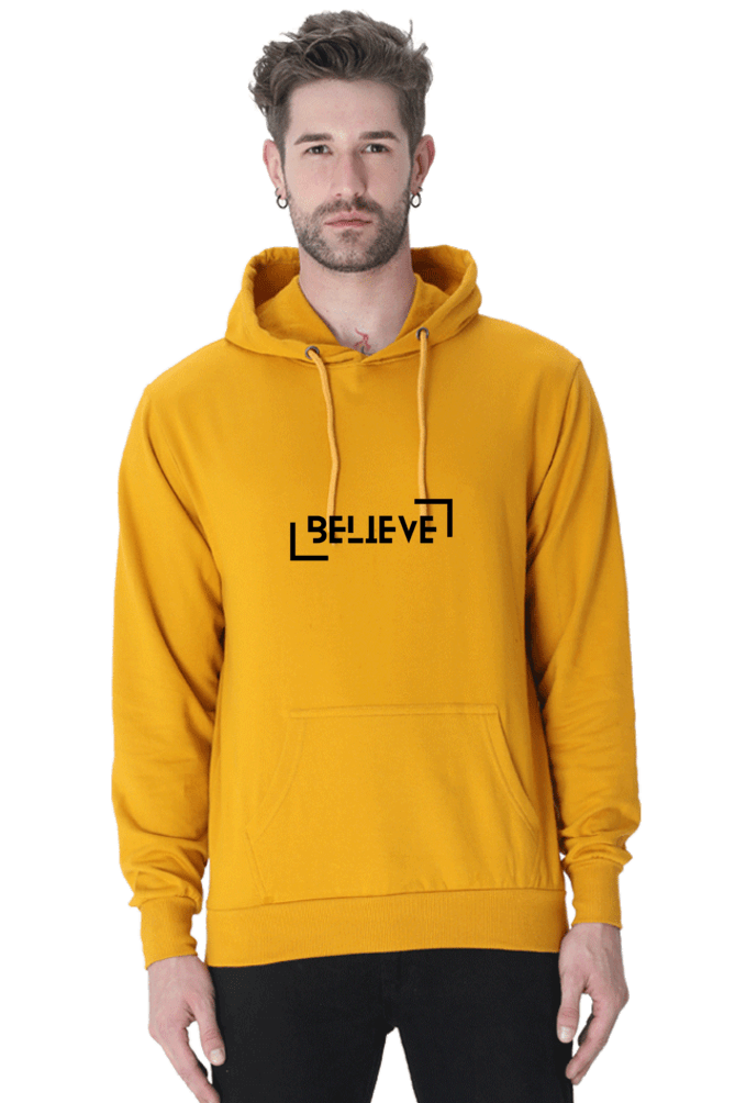 Unisex Believe Hooded Sweatshirt in vibrant yellow, providing warmth and style for winter wear.