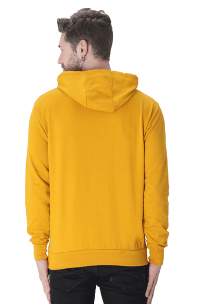 Unisex Believe Hooded Sweatshirt in vibrant yellow, featuring a cozy hood and stylish design, perfect for winter wear.