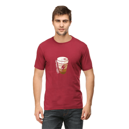Man wearing Coffee Charging Round Neck Unisex T-Shirt in maroon color with coffee cup graphic design.