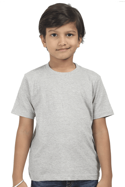 Boy wearing a kids plain round neck grey t-shirt made from durable 180 GSM bio-washed fabric, perfect for comfortable everyday wear