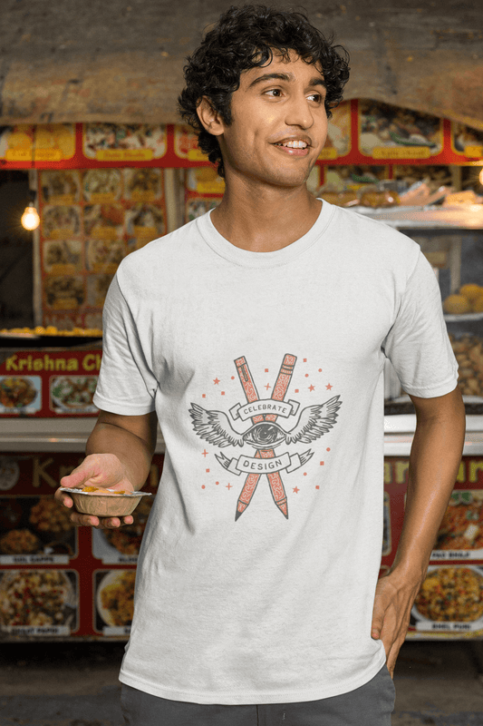 Man wearing Celebrate Design Unisex Tshirt in front of food stall.