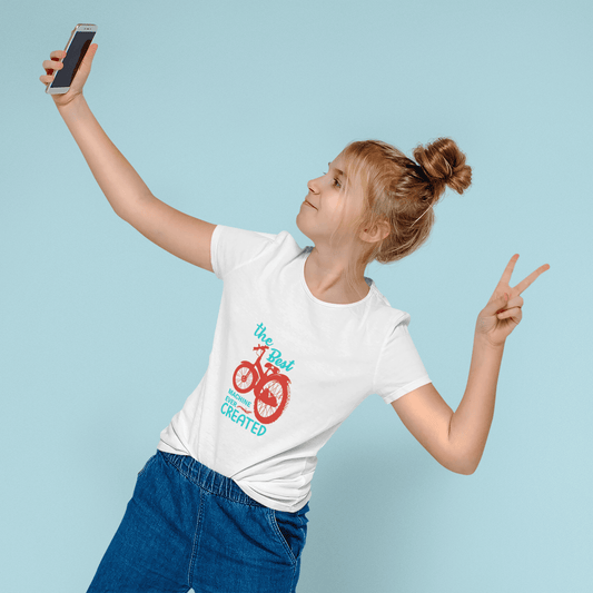 Girl wearing The Best Machine Ever Created Kids Round Neck T-shirt taking a selfie and making a peace sign